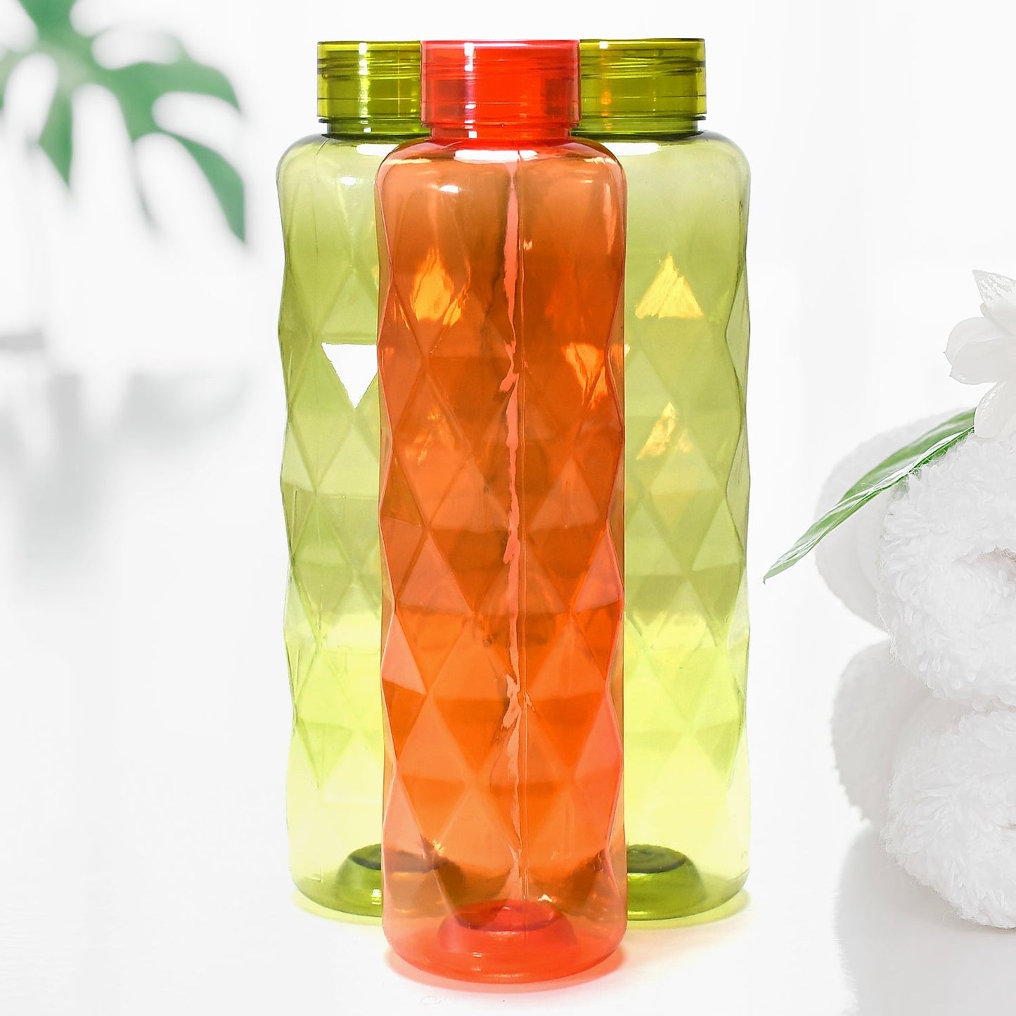 Diamond-cut bottle featuring a unique design for storing beverages.