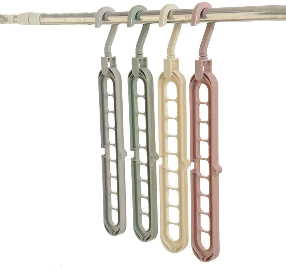 Magic wardrobe hangers with an anti-skid surface and multiple holes.