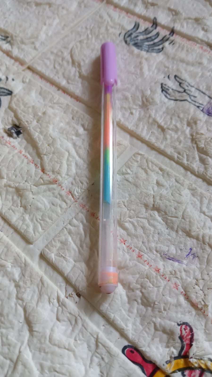 Detailed look at the 6-in-1 color change pen, showing the different colors available.